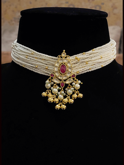 Oval center paachi kundan tukdi with side cheed strings set