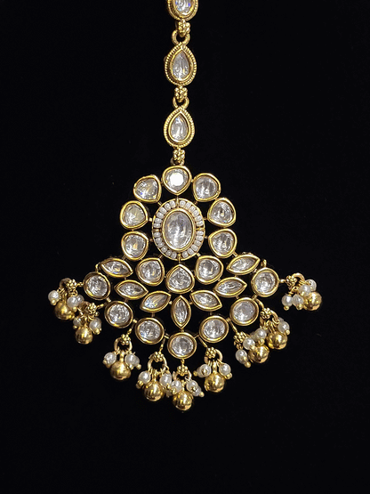 Round kundan tukdies with pirohi work long antique gold tassels set