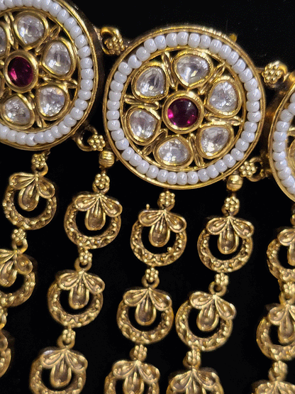 Round kundan tukdies with pirohi work long antique gold tassels set
