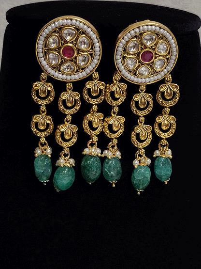 Round kundan tukdies with pirohi work long antique gold tassels set