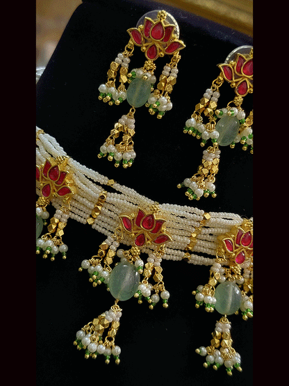 Five lotus paachi kundan choker set with aqua green drops