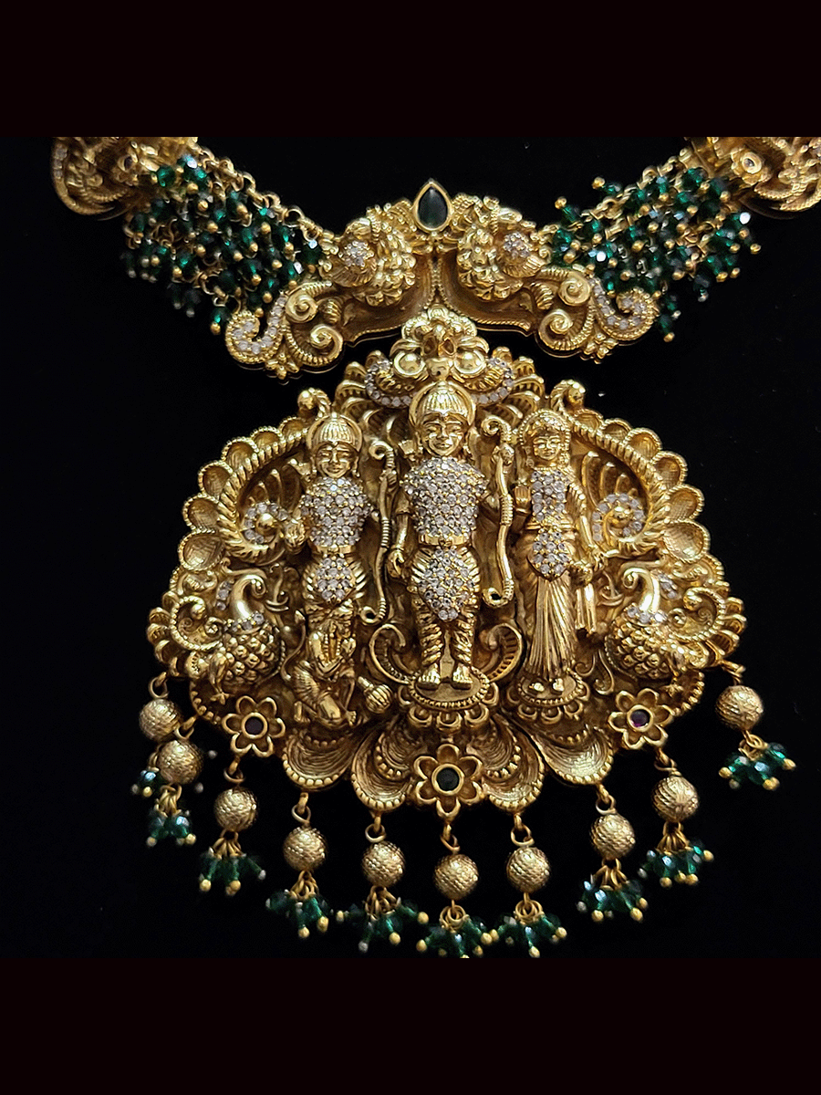 Ram durbar AD studded bold pendant set with side peacock design tukdies and beaded string