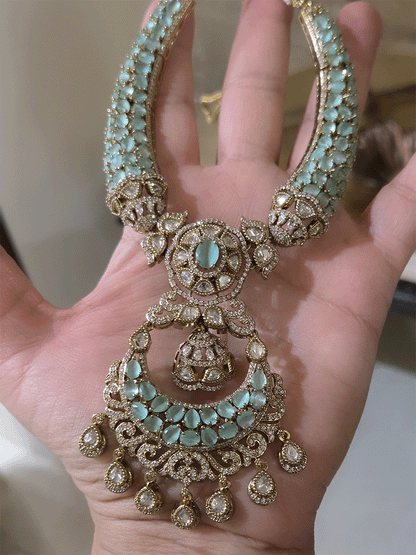 Mehandi finish stones studded moissanite set with chandbali design center