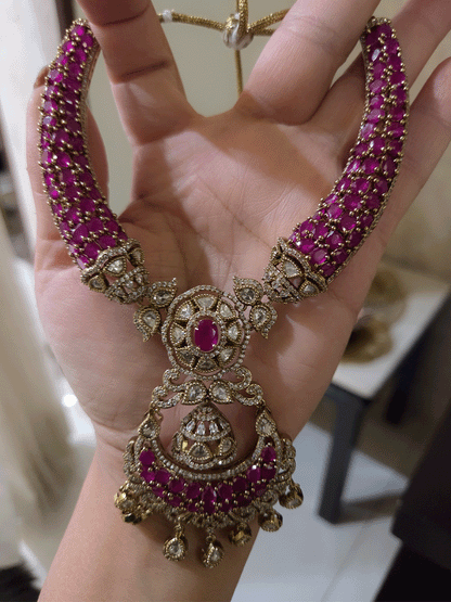 Mehandi finish stones studded moissanite set with chandbali design center