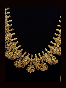 Long gold plated laxmiji motif's in leaf design tukdies set with ruby and green stones