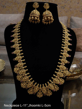 Load image into Gallery viewer, Long gold plated laxmiji motif&#39;s in leaf design tukdies set with ruby and green stones