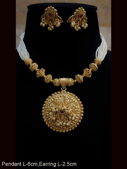Circular pendant with leaf design and pearly hangings in cheed strings set