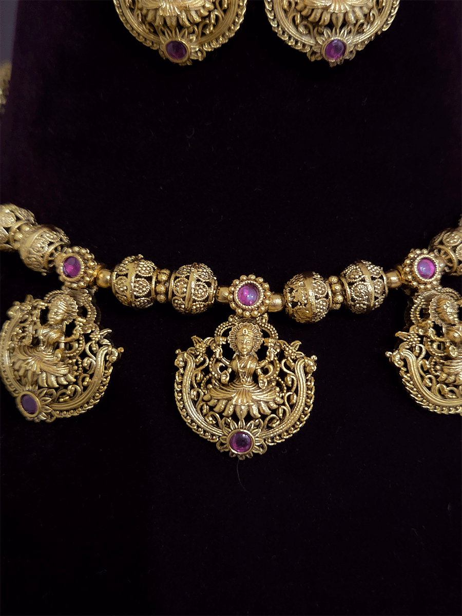 Laxmiji tukdies in matar bead string ruby stone set