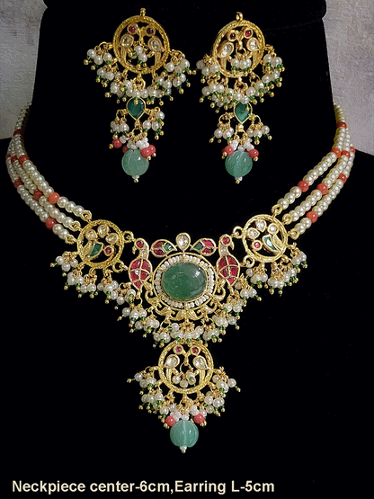 Aqua oval stone in the center with peacock side design aqua drops three pearl strings paachi kundan set