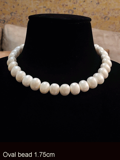 1.75 cm egg shell bead 8 inch long string
