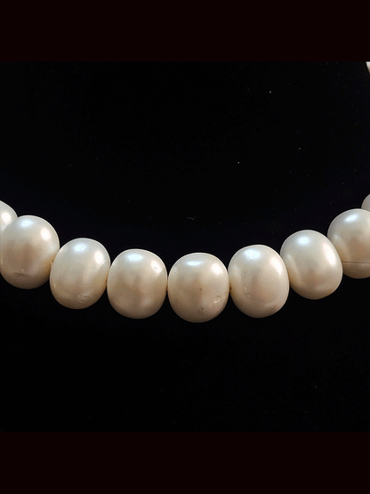 1.75 cm egg shell bead 8 inch long string