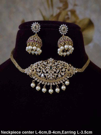 Zircon studded side peacock design with green stone center sleek set with pearl drops