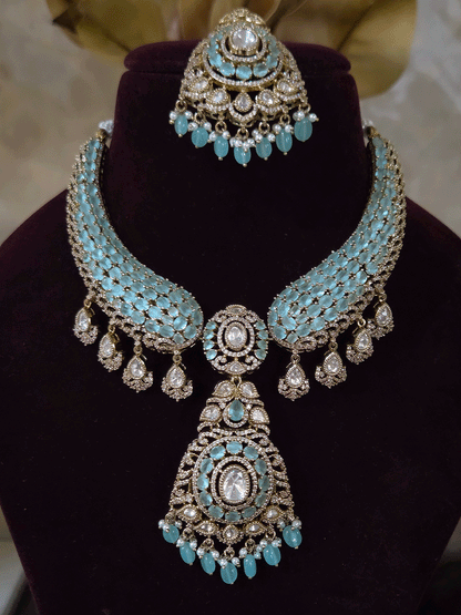 Oval shaped moissanite pendant with stones studded hasli set in mehandi finish