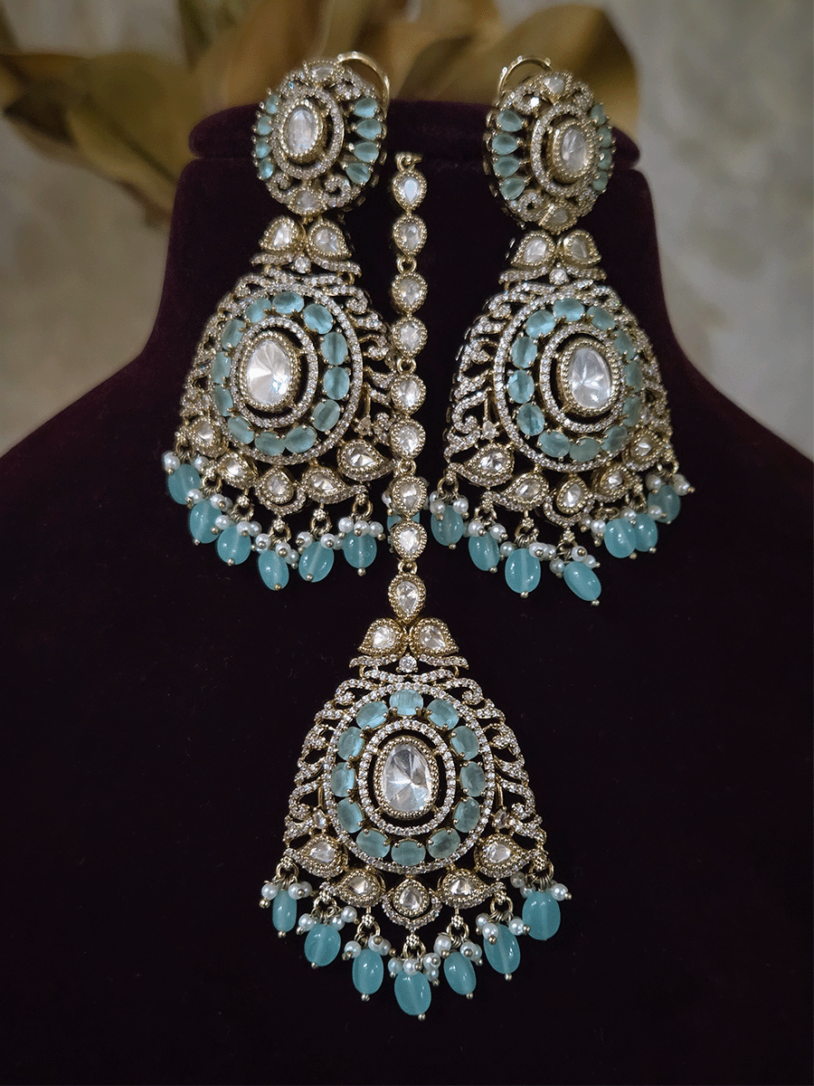 Oval shaped moissanite pendant with stones studded hasli set in mehandi finish