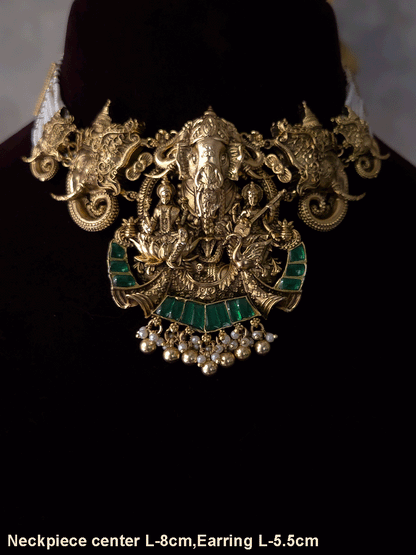 Ganpatiji with Laxmiji and Saraswatiji on both sides bold center design set with intricately carved ganpatiji faces on sides