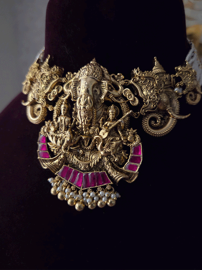 Ganpatiji with Laxmiji and Saraswatiji on both sides bold center design set with intricately carved ganpatiji faces on sides
