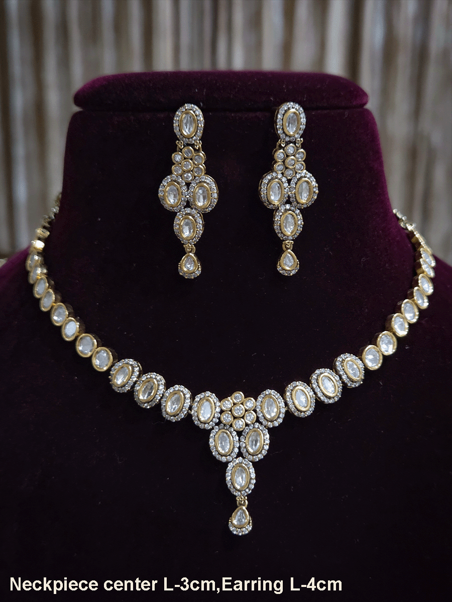 Flower in center of oval moissanite setting sleek antique gold finish set