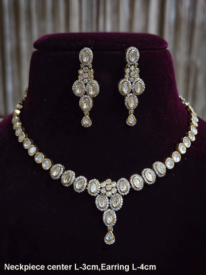 Flower in center of oval moissanite setting sleek antique gold finish set