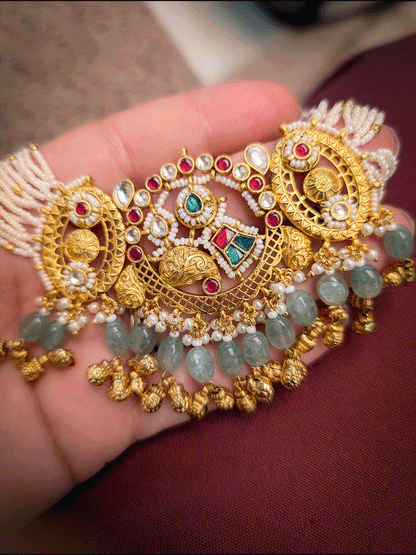 Paisley design paachi kundan center with oval side design aqua bead and ghunghru hangings set