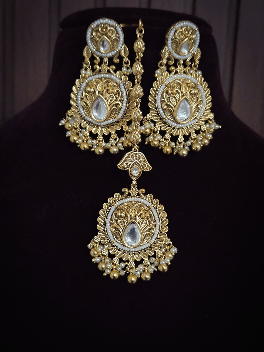 Gold finish kundan embedded set with tukdi tassel design