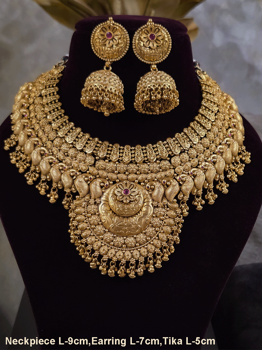 9cm circular design center with ruby stone flower broad set with peacock motif's