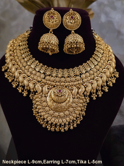 9cm circular design center with ruby stone flower broad set with peacock motif's
