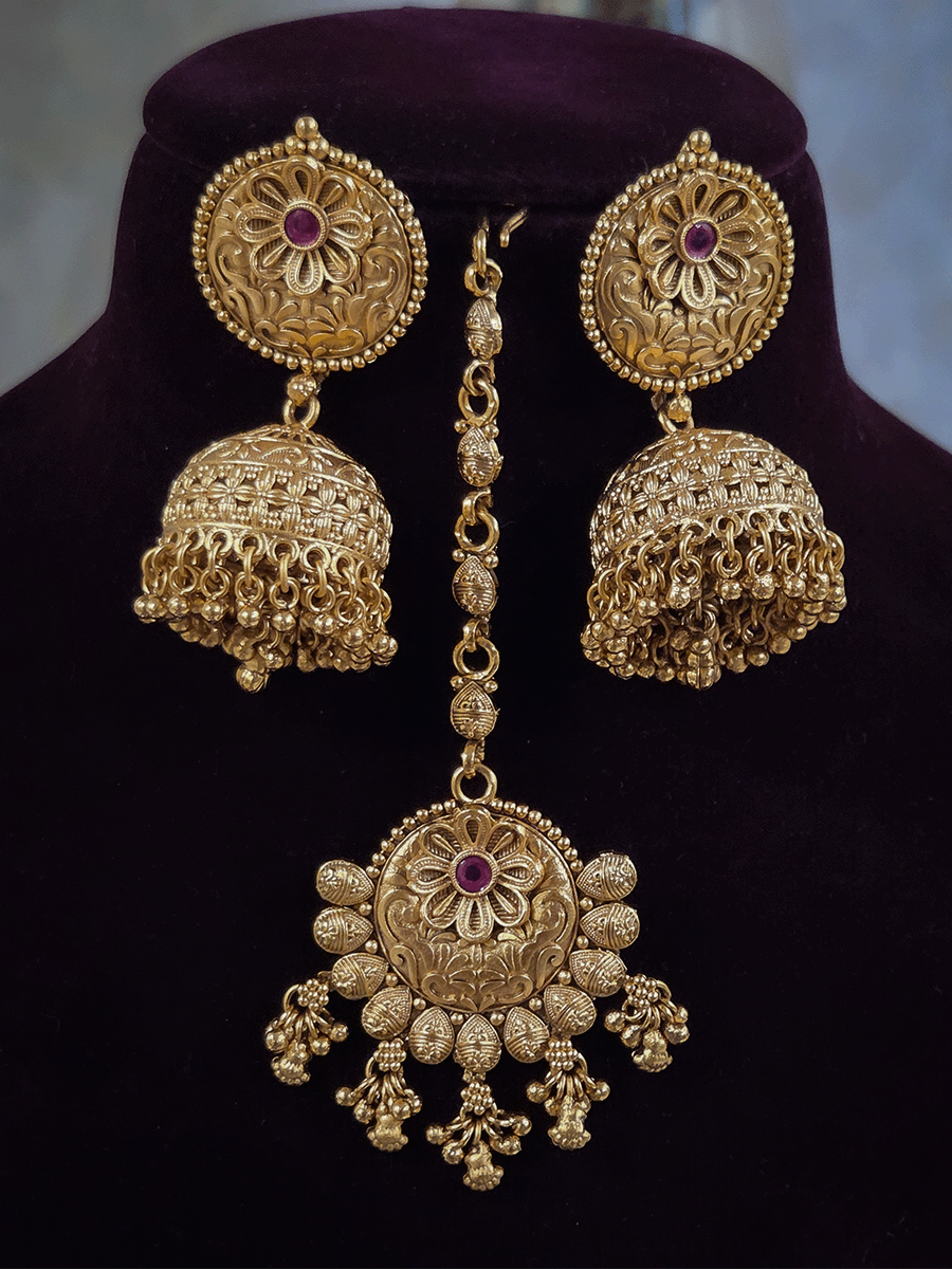 9cm circular design center with ruby stone flower broad set with peacock motif's