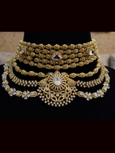 Load image into Gallery viewer, Oval tukdies with polki embedded five line top with three layer zircon and polki frill broad set