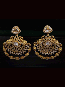 Oval tukdies with polki embedded five line top with three layer zircon and polki frill broad set
