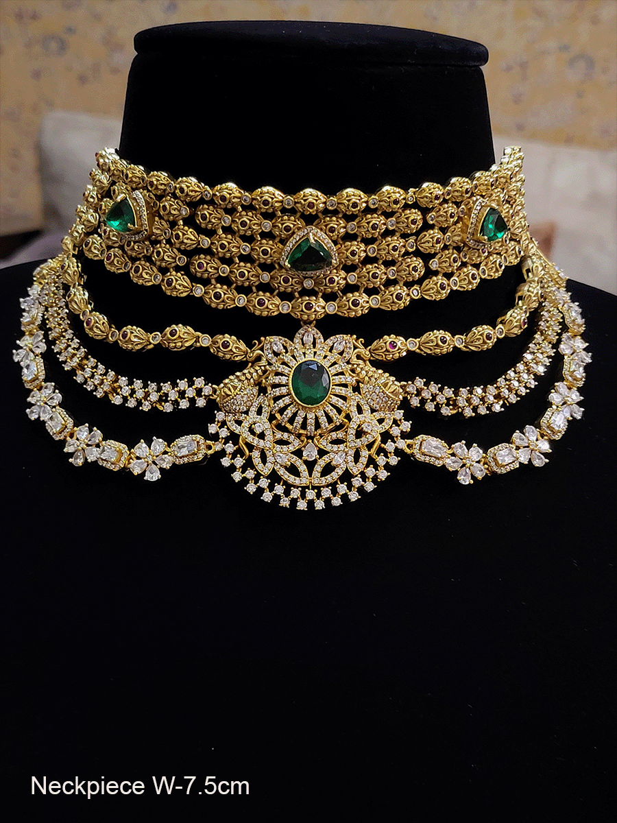 Oval tukdies with polki embedded five line top with three layer zircon and polki frill broad set