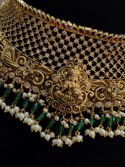 Ruby stones top mesh design laxmiji broad set with green drops and intricate side design