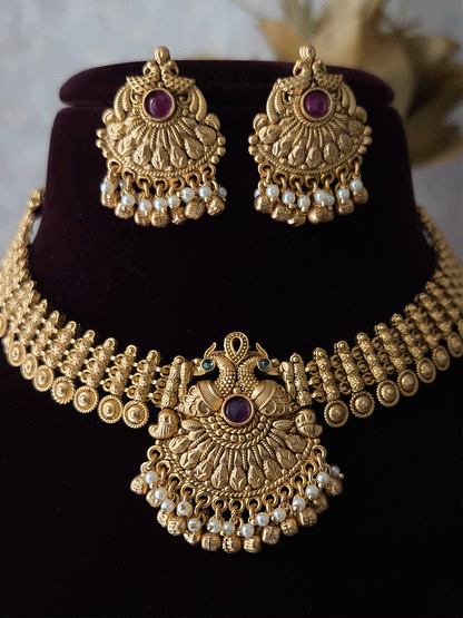 Broad chain with circular design with peacock design ruby,green stone center set