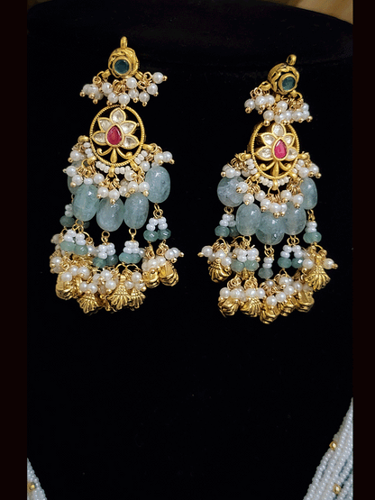 Antique gold finish 8 inch long string paachi kundan pendant set with aqua and ghunghru hangings