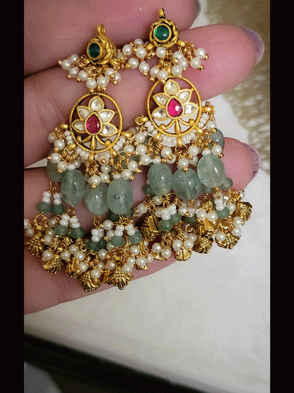 Antique gold finish 8 inch long string paachi kundan pendant set with aqua and ghunghru hangings