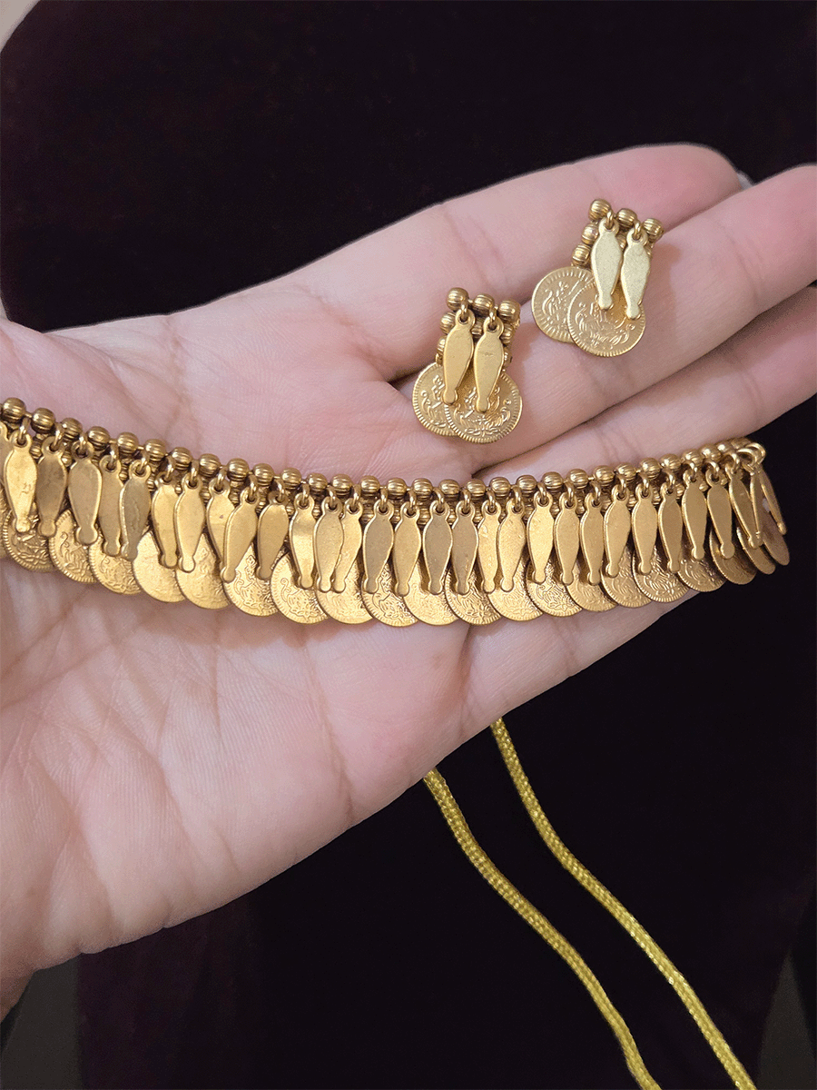 Traditional coin design set with falling leaves top line