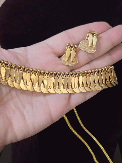 Traditional coin design set with falling leaves top line