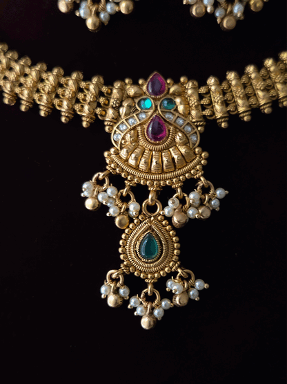 Kundan,green and ruby stone peacock design side broad chain set
