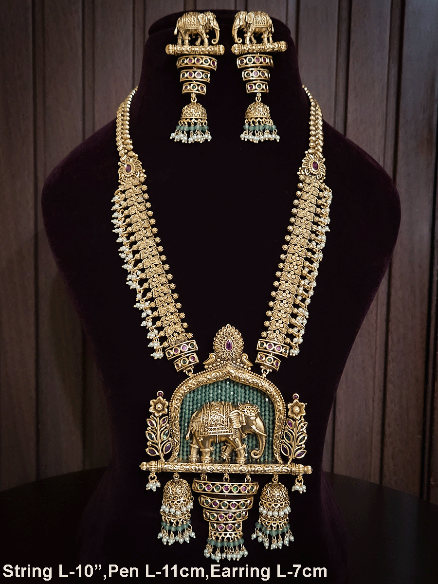 Broad chain with pearly hangings long elephant motif pendant set on aqua beads back