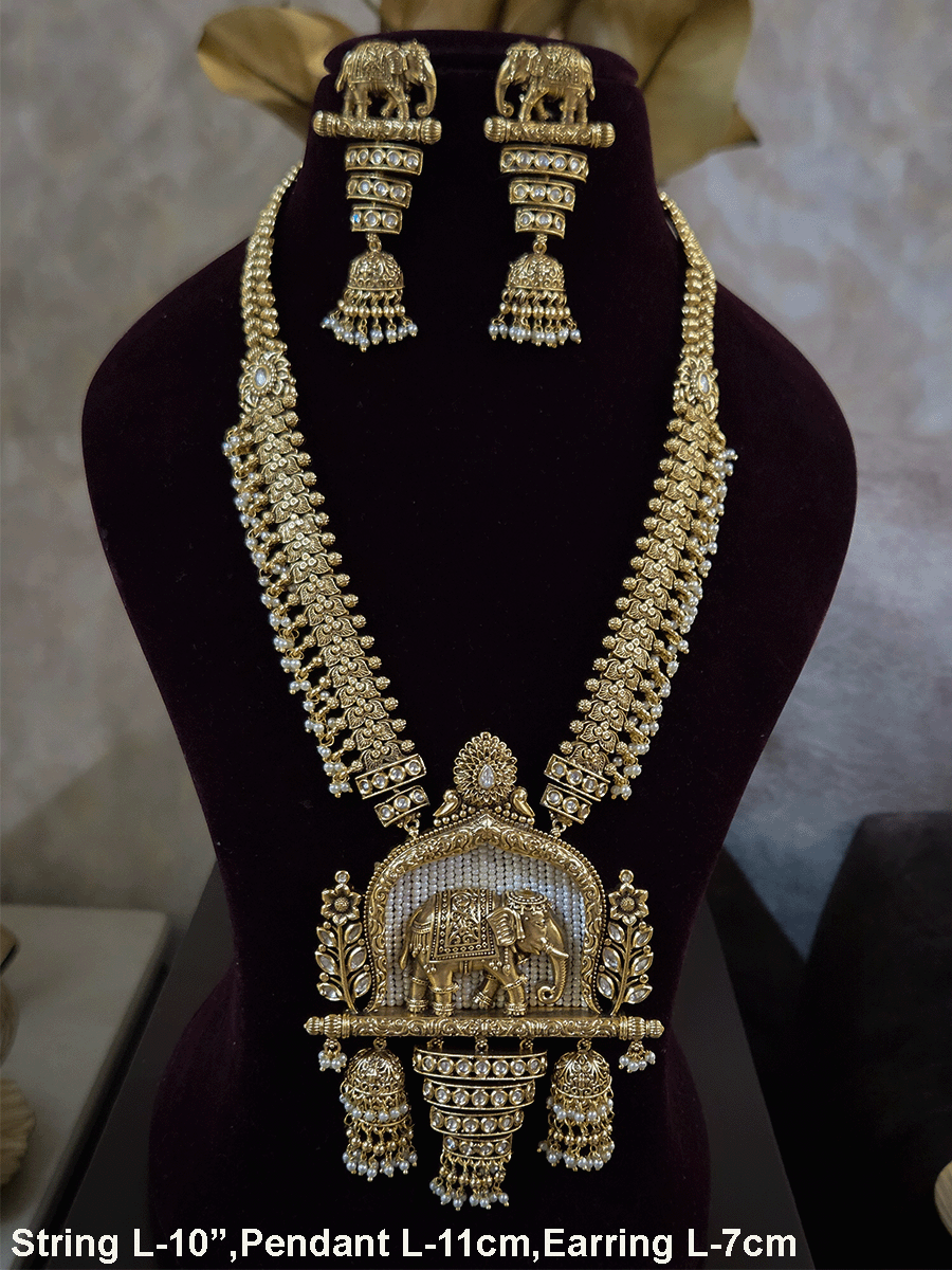 Broad chain with pearly hangings long elephant motif pendant set on beads back