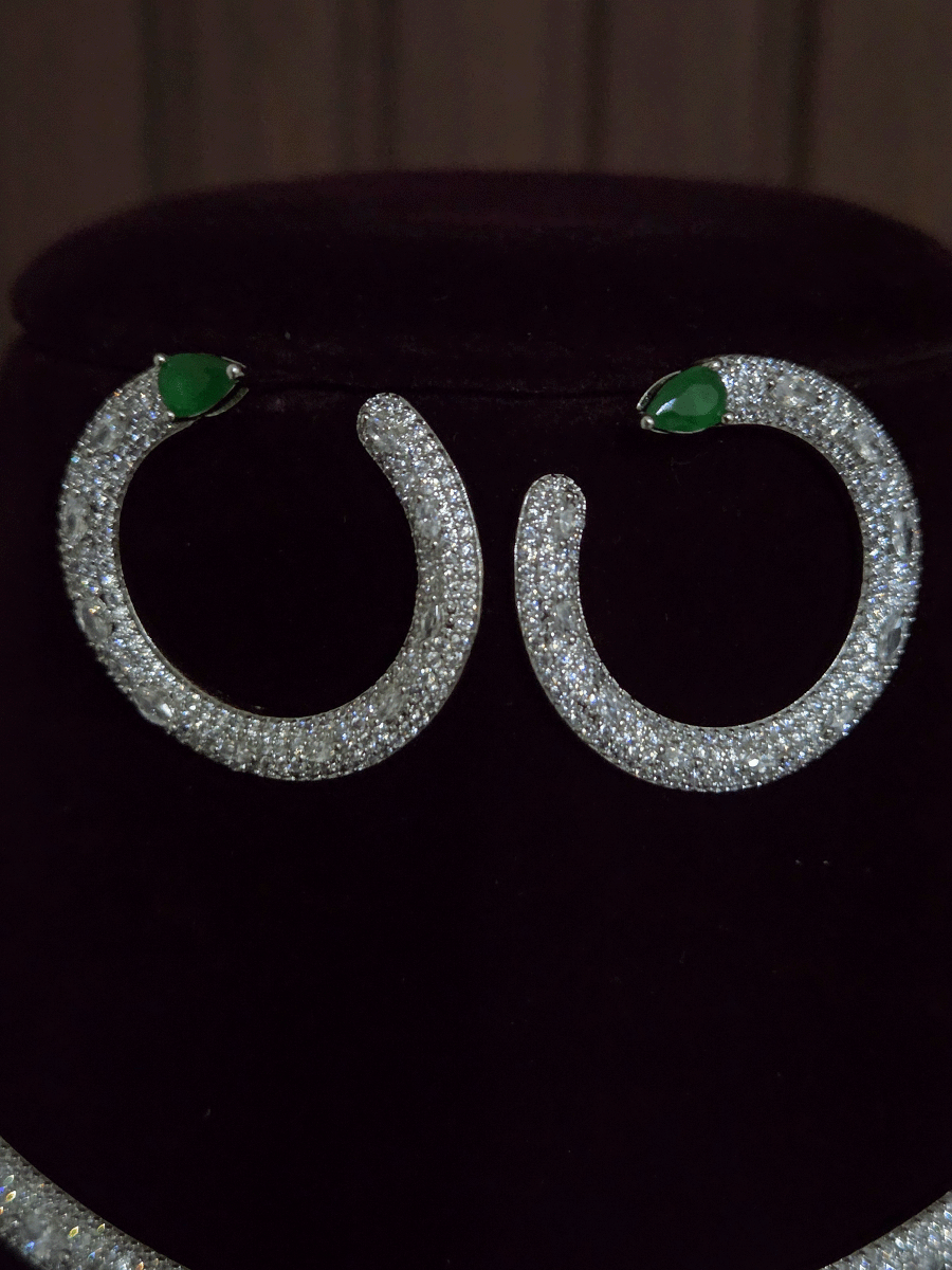 Sleek silver finish AD Hasli with coloured tear shaped stone