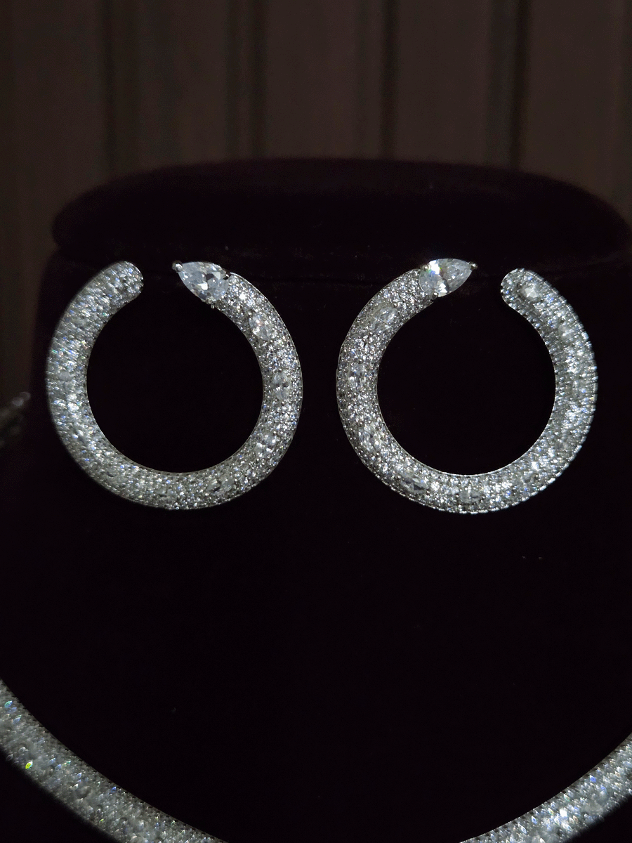 Sleek silver finish AD Hasli with coloured tear shaped stone