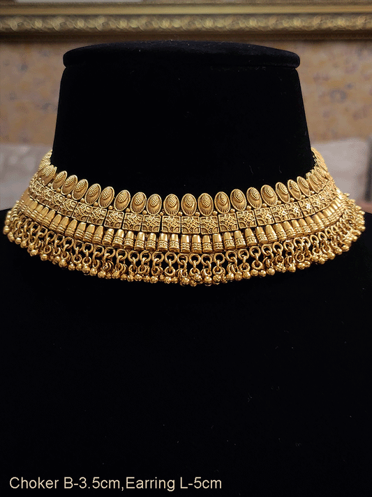 Broad necklace set with oval design lace on top edge and ghunghru hangings at bottom