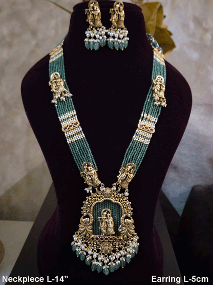 Intricate carving pendant set with Radha Krishna motif in center and Radha krishna motif's on side multiple bead strings