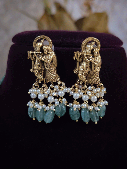 Intricate carving pendant set with Radha Krishna motif in center and Radha krishna motif's on side multiple bead strings