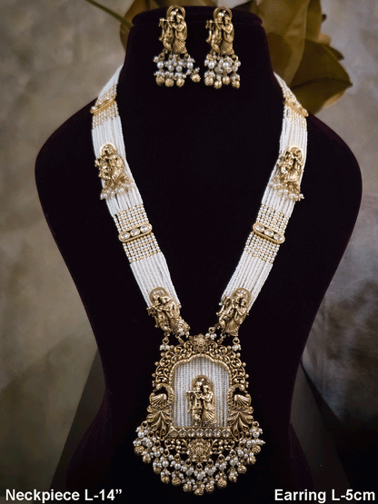 Intricate carving pendant set with Radha Krishna motif in center and Radha krishna motif's on side multiple bead strings