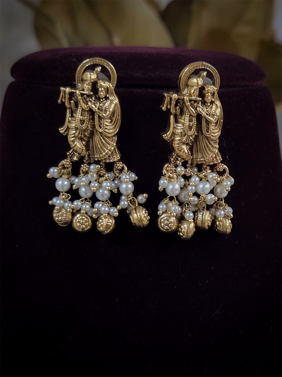 Intricate carving pendant set with Radha Krishna motif in center and Radha krishna motif's on side multiple bead strings