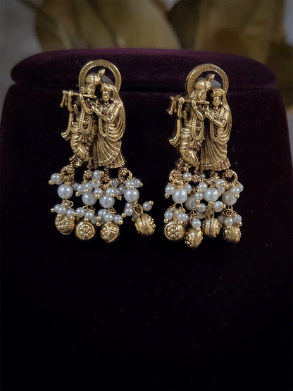 Intricate carving pendant set with Radha Krishna motif in center and Radha krishna motif's on side multiple bead strings