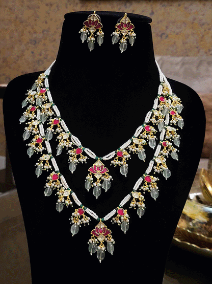 Paachi kundan double layer lotus tukdi in the center with aqua green drops set