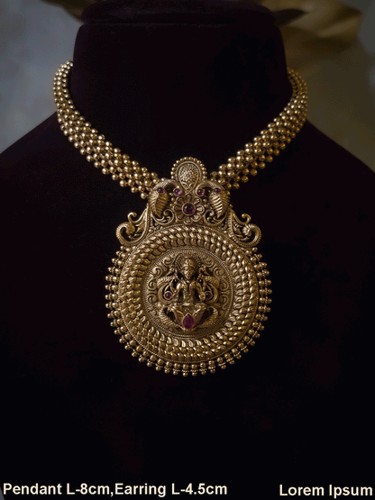 Laxmiji motif bold pendant set with woven gold beaded string
