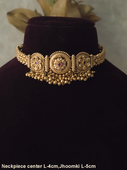 Three ruby stone flowers in circular design set with ghunghru hangings